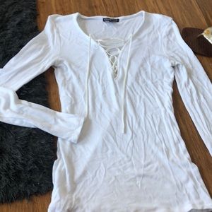 White long-sleeve lace up top